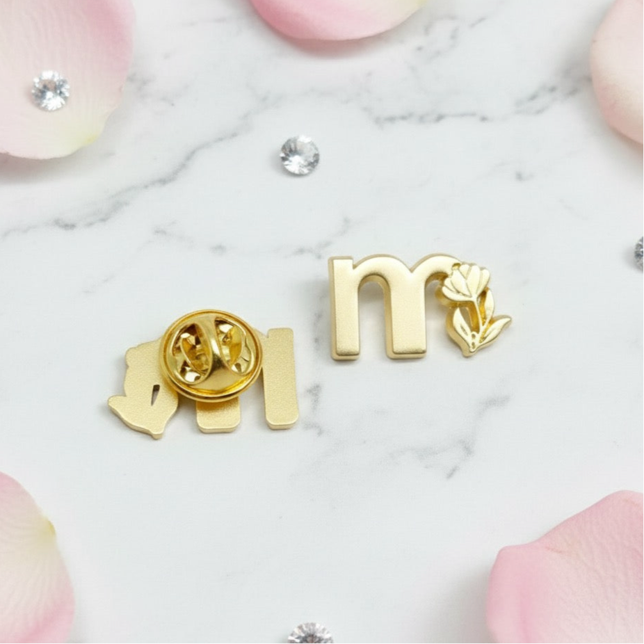Modessa enamel pin